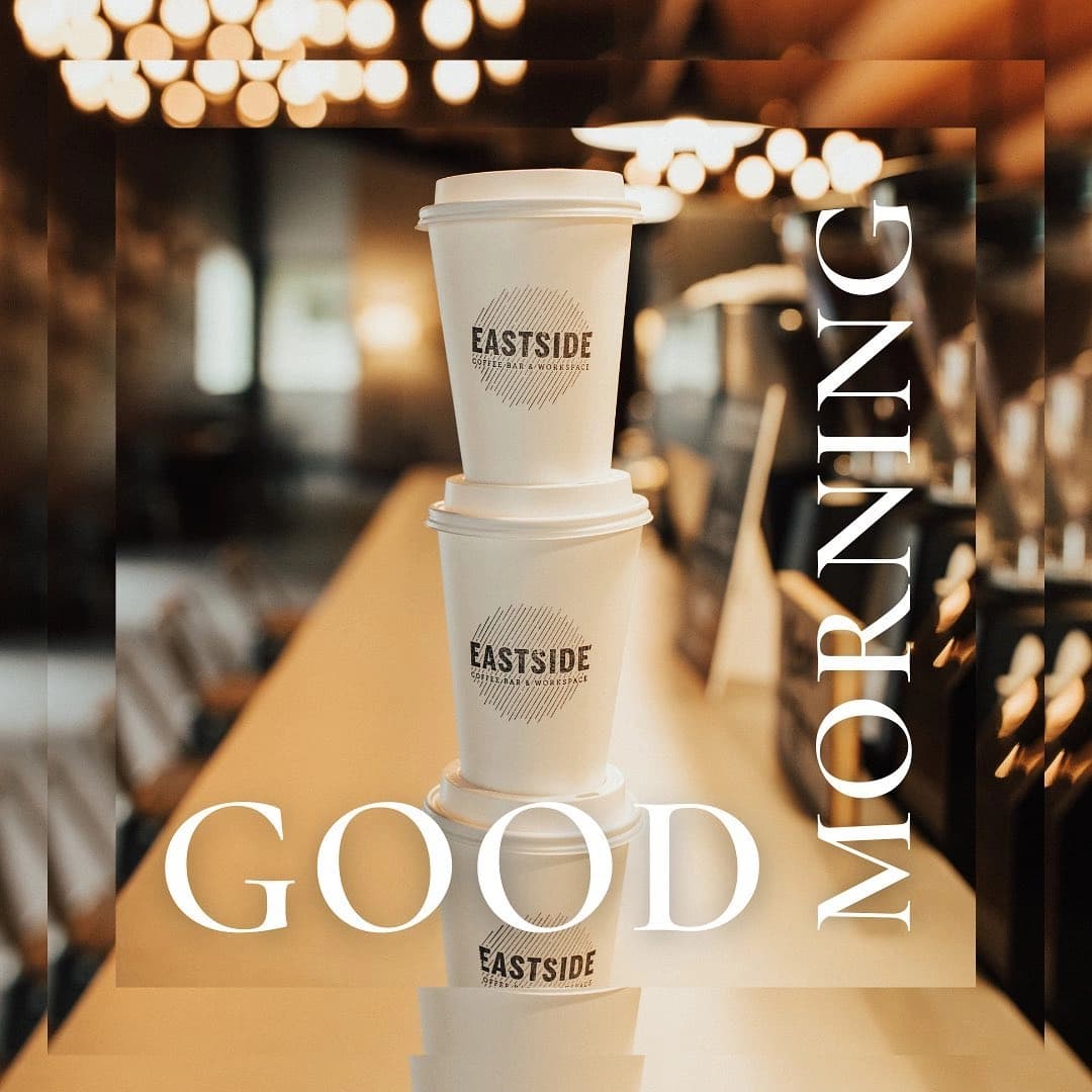 Stacked coffee cups with Good Morning text
